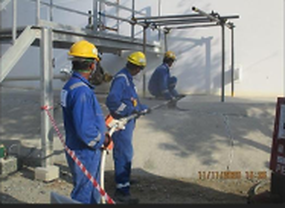 Workers installing CorroLogic injectors